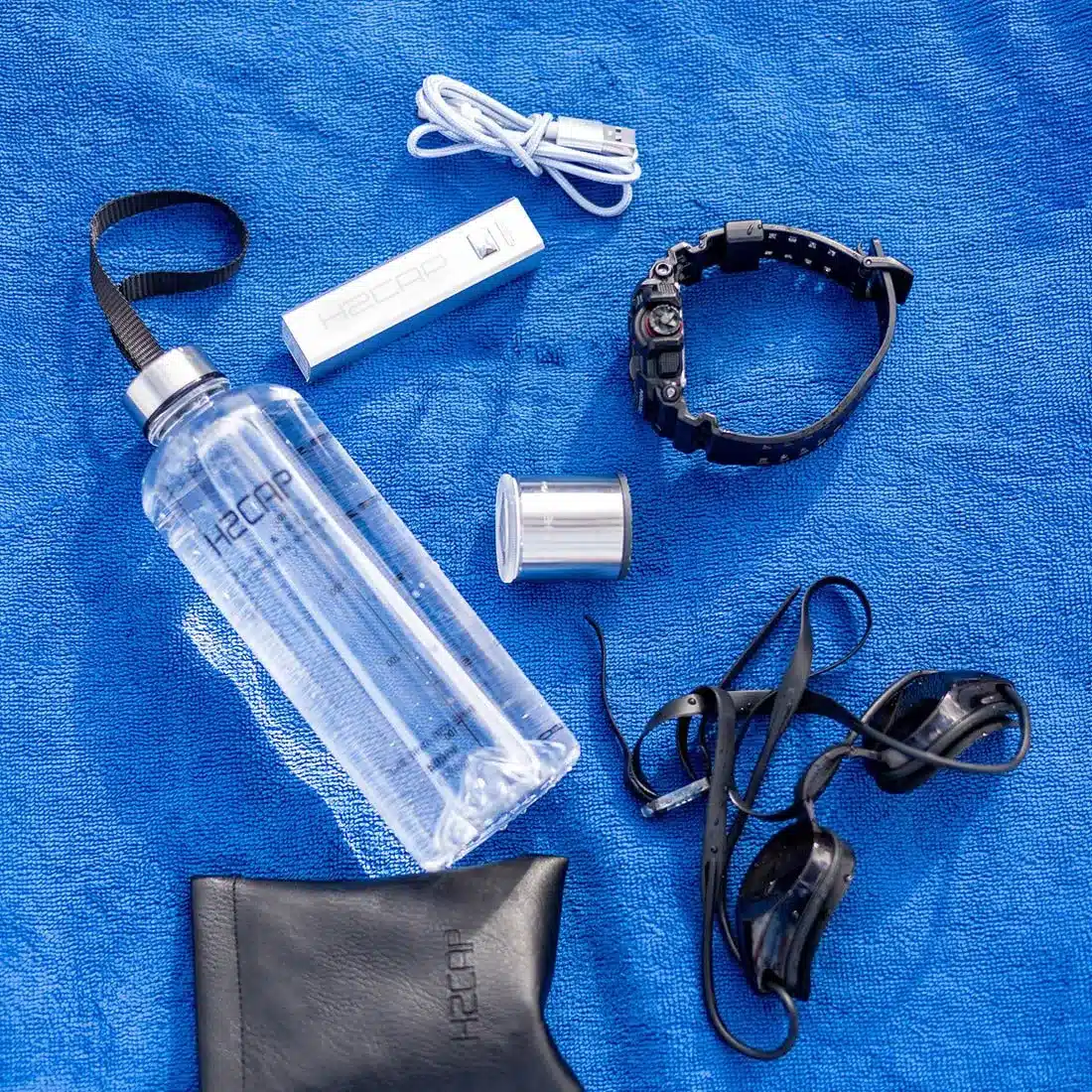 H2CAP PLUS hydrogen water bottle with its everyday carry kit